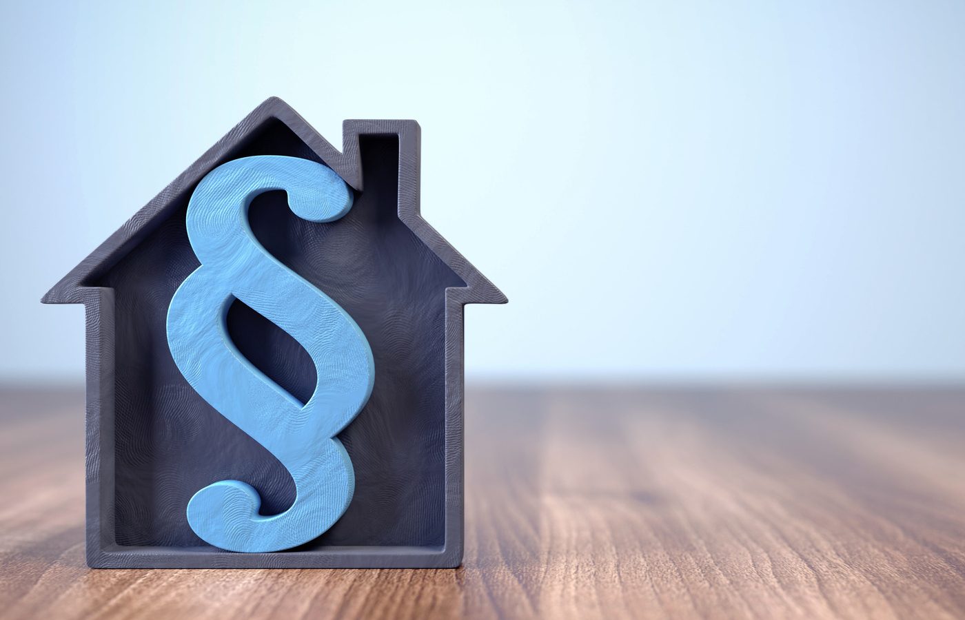 Güterrecht: Paragraph-Symbol im Haus, Symbol für Vermögensaufteilung bei Trennung/Scheidung, BGH Urteil.